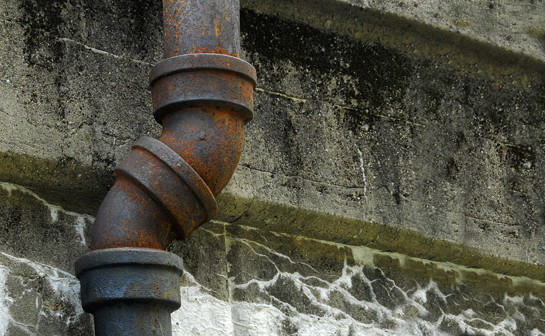 Cast iron drain pipe.