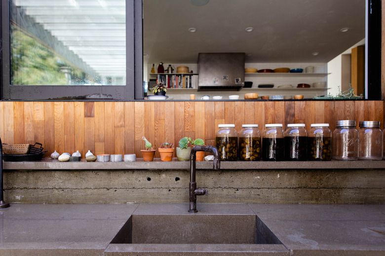 close up of concrete kitchen countertop and sink