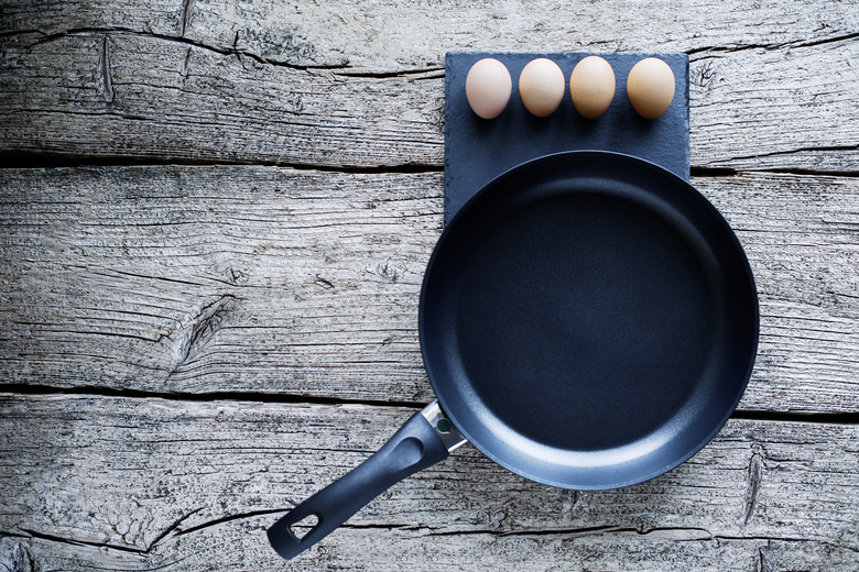 Cooking eggs on a frying pan