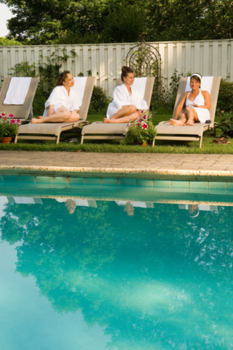 People sitting pool-side.