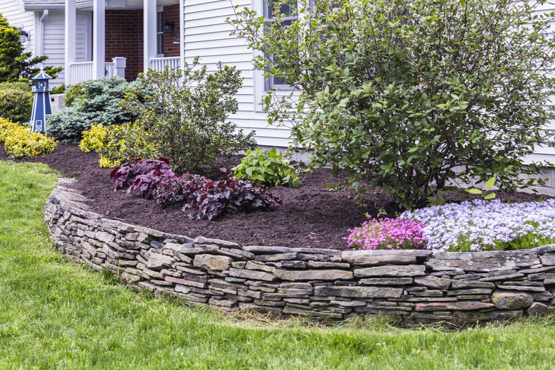 New Mulch Behind Landscaped Garden Terrace Wall