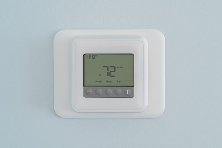 Modern residential programmable heating and cooling thermostat