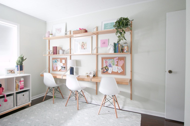 IKEA kids' bedroom idea wall-mounted desks with midcentury chairs