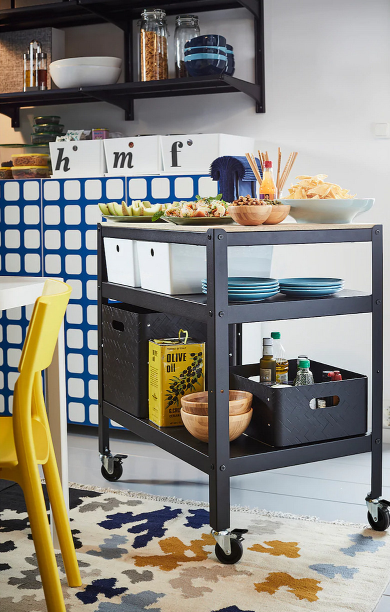 Industrial IKEA kitchen island in black with wheels in contemporary kitchen