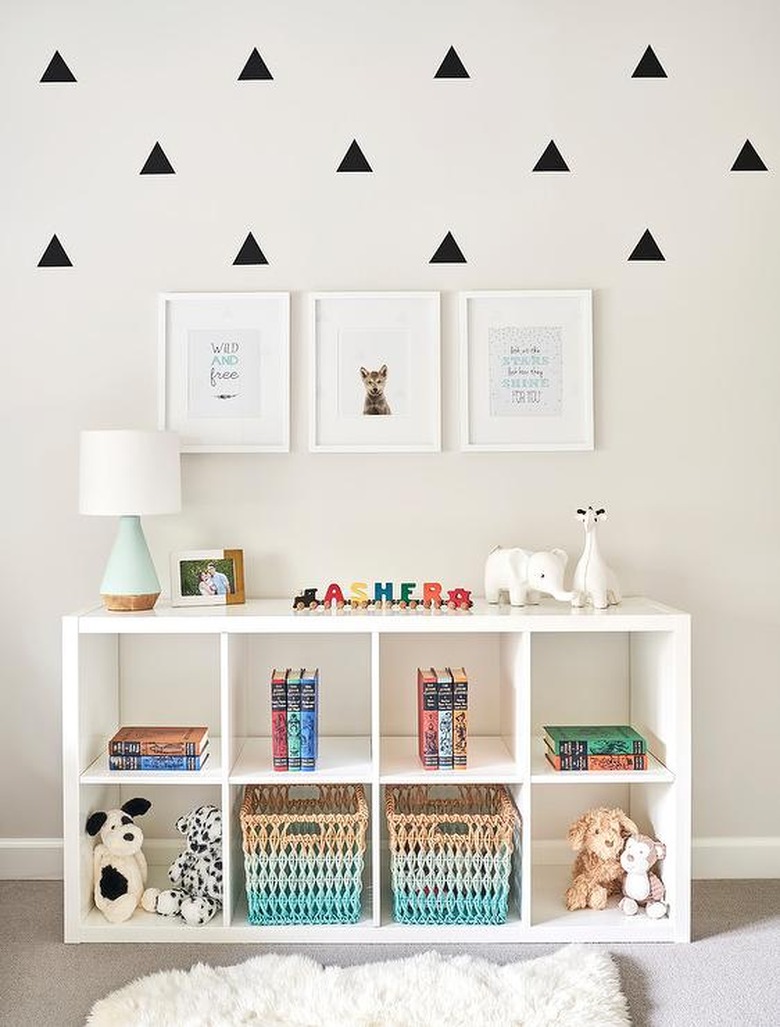 nursery idea with IKEA bookcase with toys and storage baskets