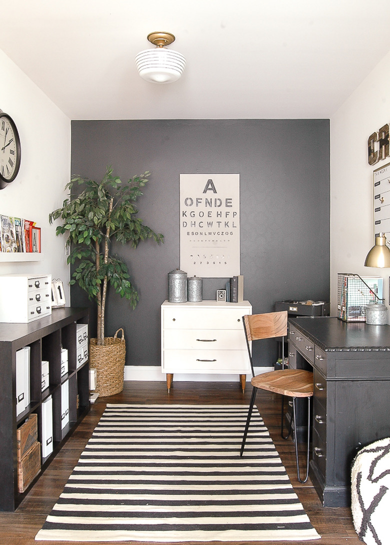 industrial office idea with black and white striped rug