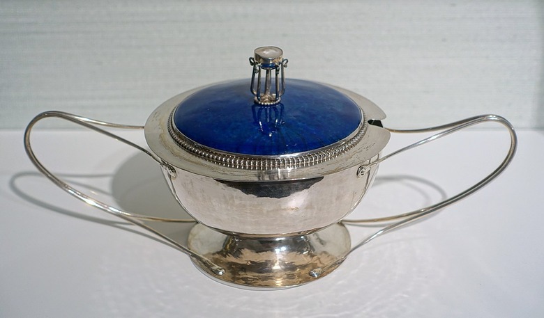 silver and blue covered bowl