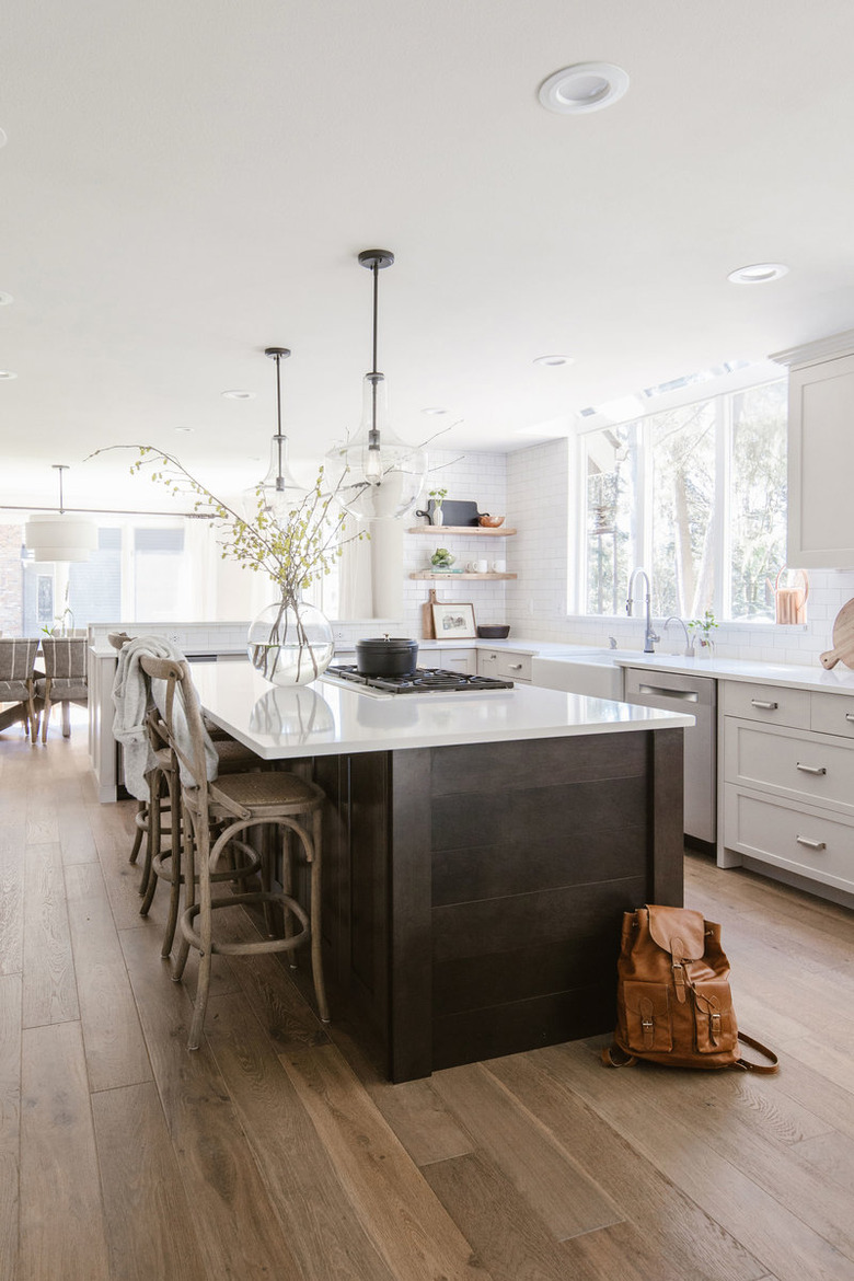 Classic kitchen design with an island stovetop designed by Krissy Peterson.