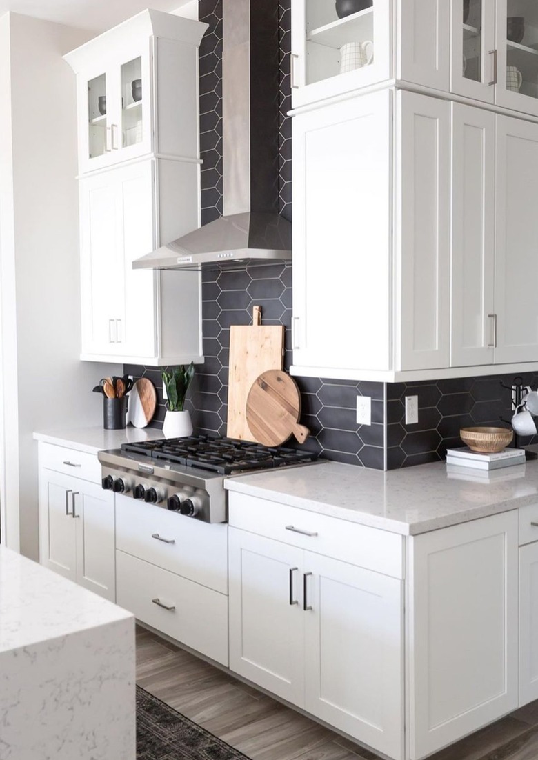 elongated black tile backsplash