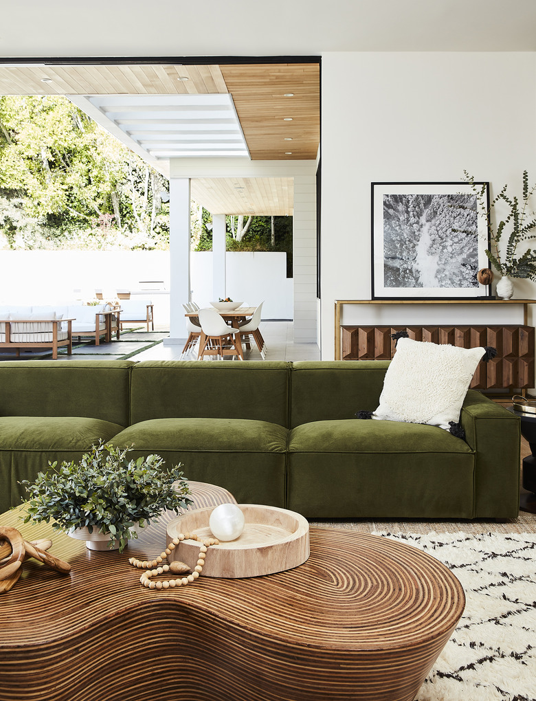 AllModern green velvet sofa in modern living room