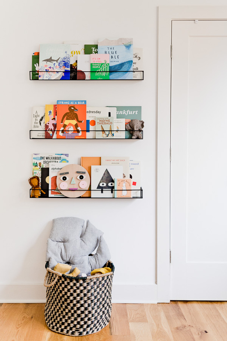 trio of oil-rubbed bronze kids' book storage idea