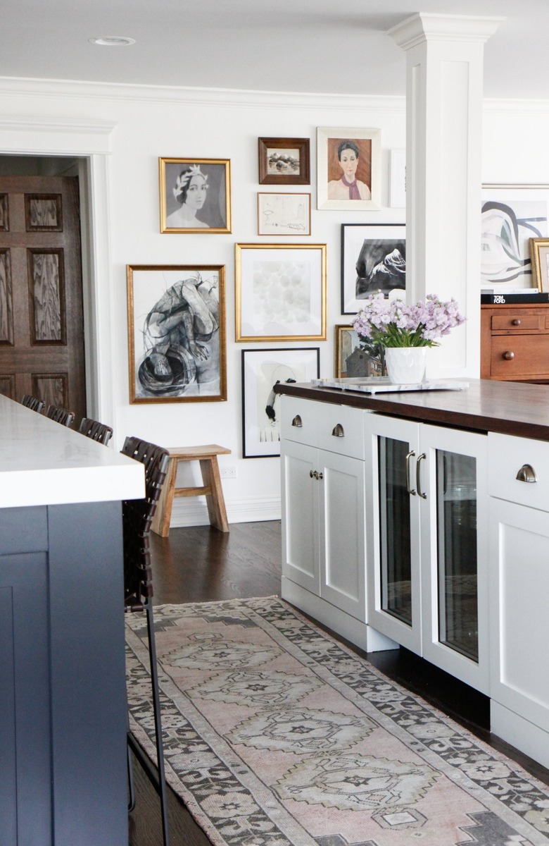 kitchen accent wall with framed artwork