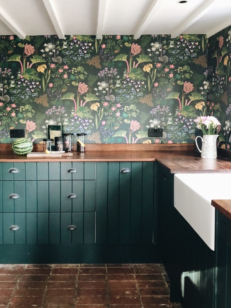 green farmhouse kitchen with statement floral wallpaper