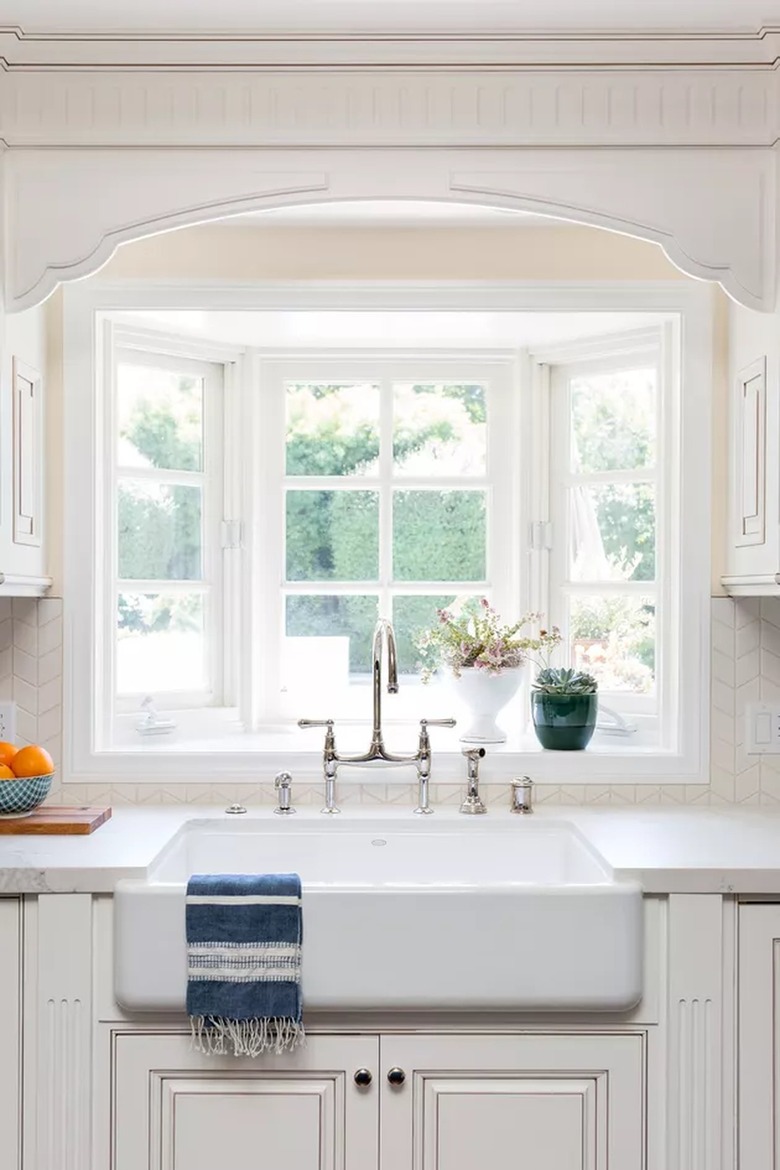 off-white cabinets in traditional kitchen