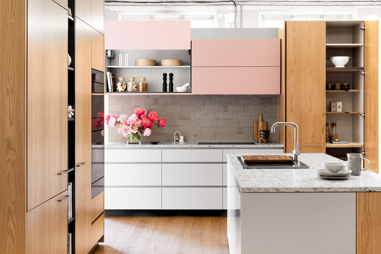 kitchen cabinet style with flat front cabinets in wood, pink, and white