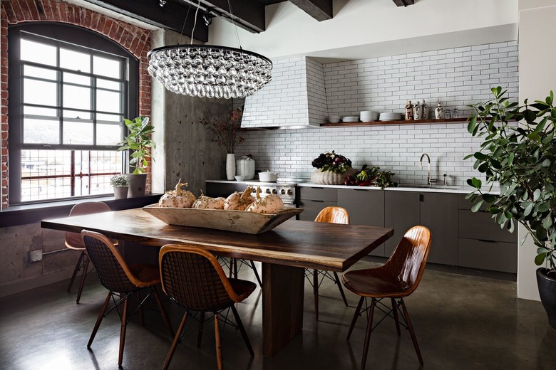 industrial kitchen with multi-tiered glass chandelier