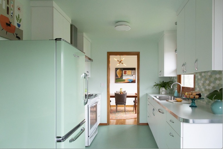 White cabinets with mint green