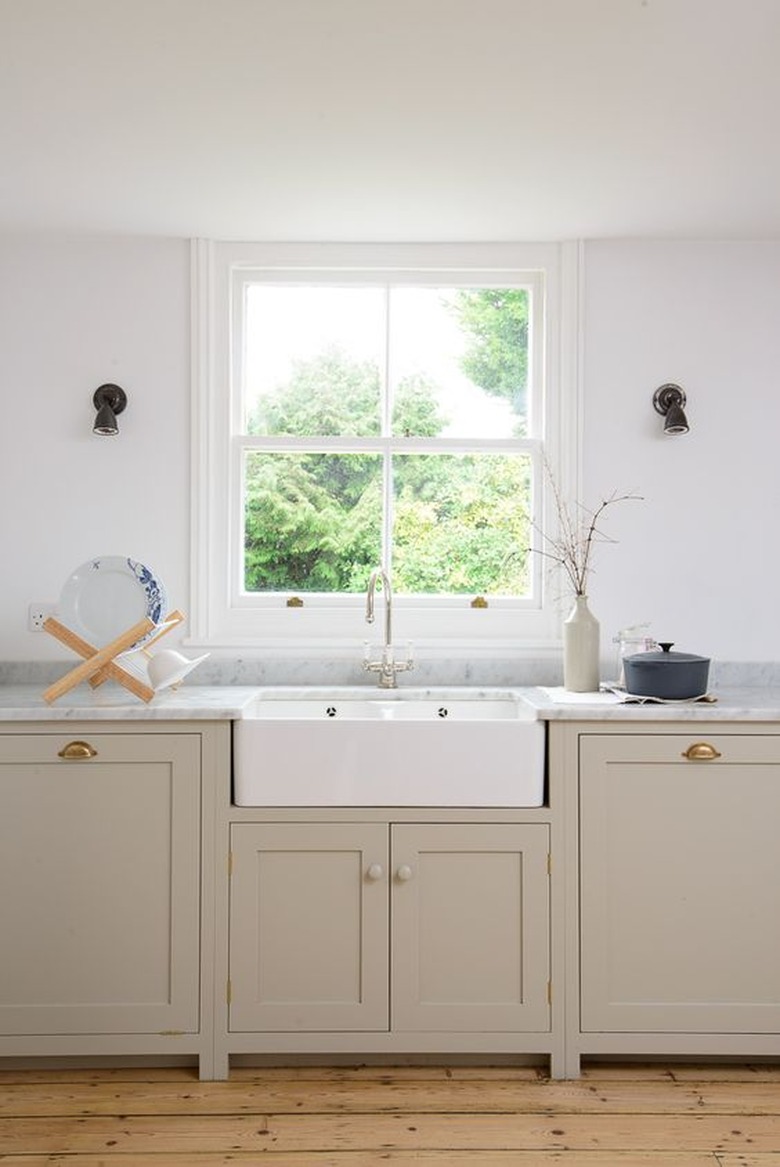 classic kitchen with mushroom colored kitchen cabinetry