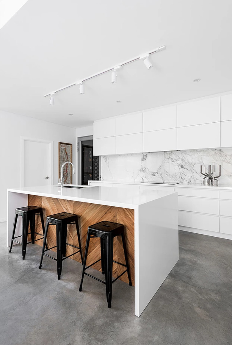 Contemporary Modern kitchen flooring idea with concrete and white cabinets