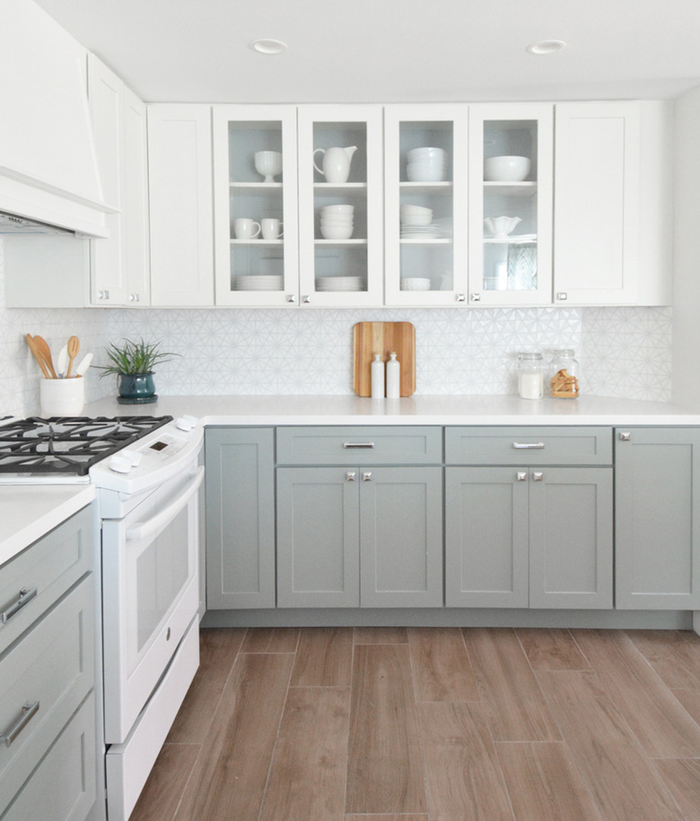 kitchen with gray cabinets and light wood floors