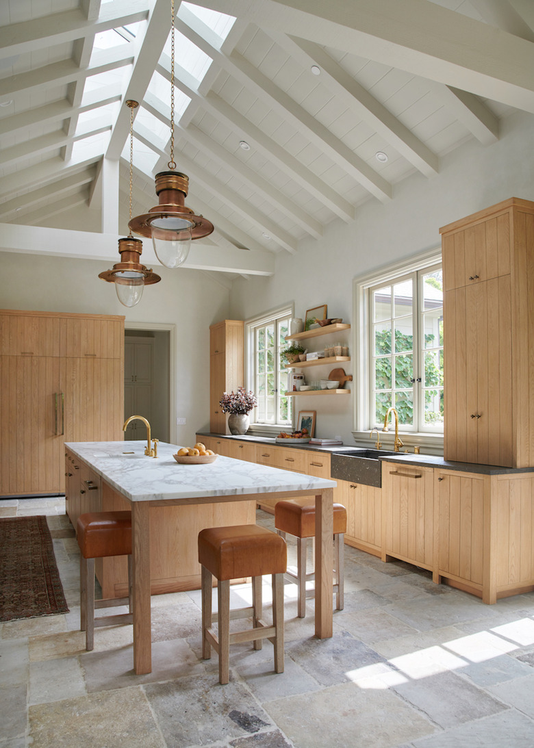 kitchen island ideas with seating in kitchen with vaulted ceiling and wood cabinets