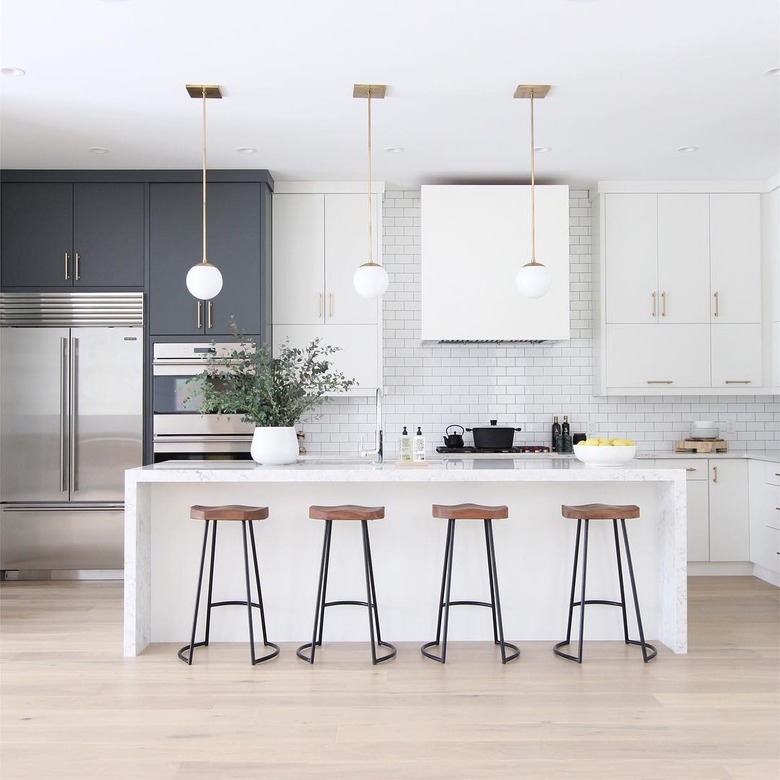 kitchen island lighting idea with globe-style pendants