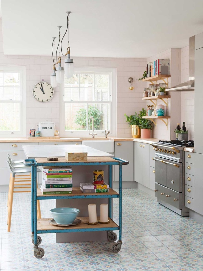 vintage blue kitchen cart in modern pink and white kitchen