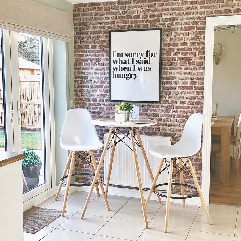 kitchen wall decor on brick wall