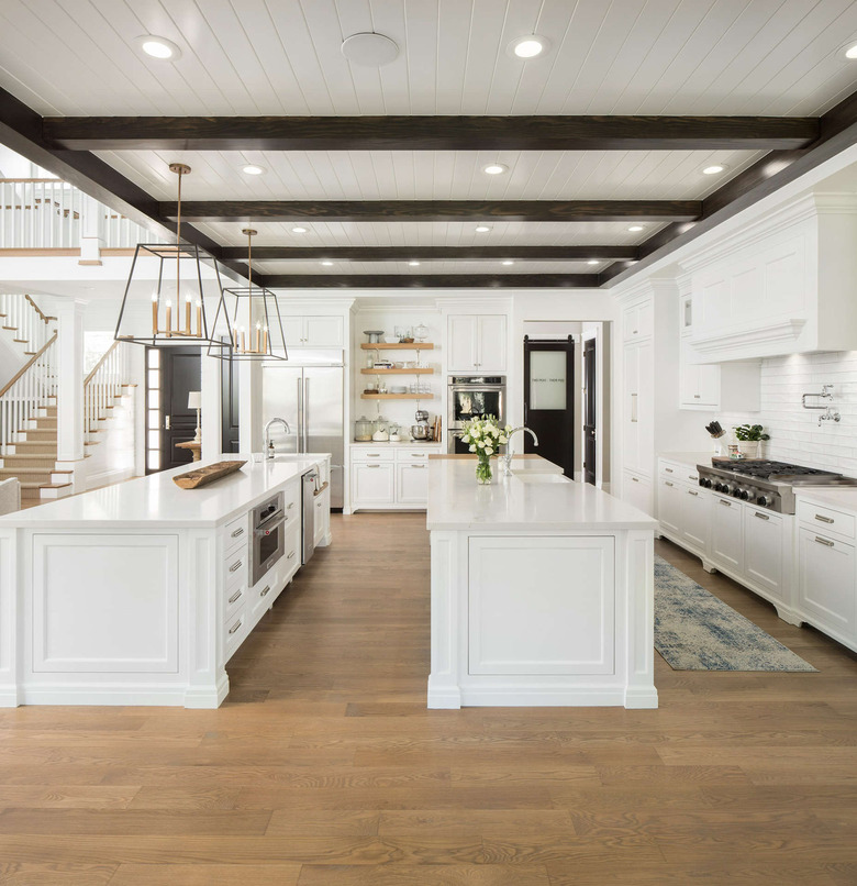 large open plan kitchen with double white island