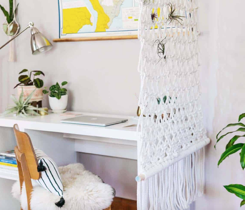 White macrame room divider.