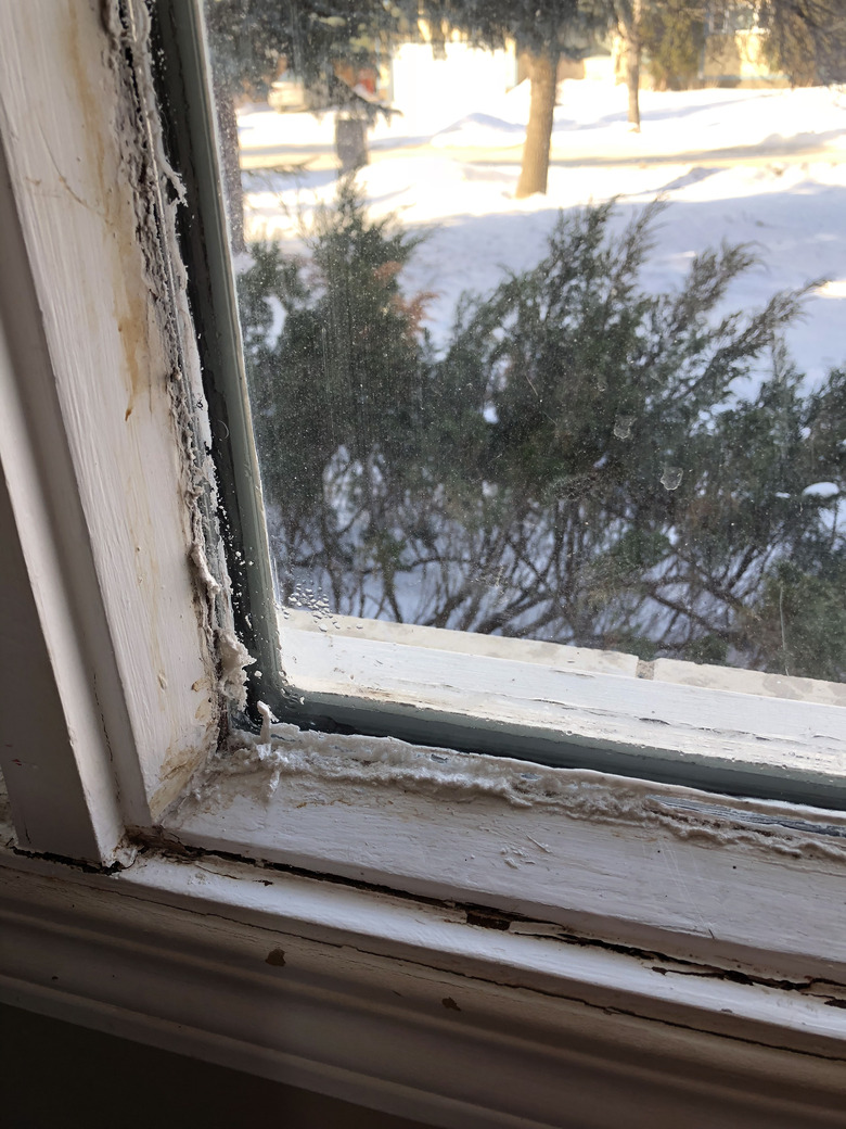 Ice and frost on a window sill.