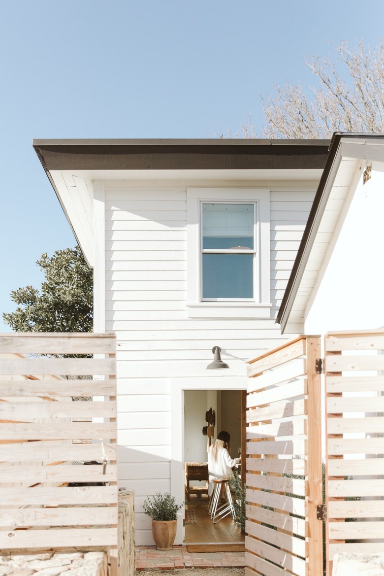 side door to wooden house