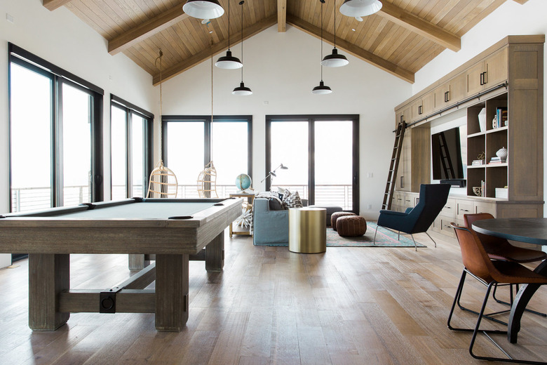 Fathers Day man cave idea with wood A-frame ceiling and industrial pendant lights