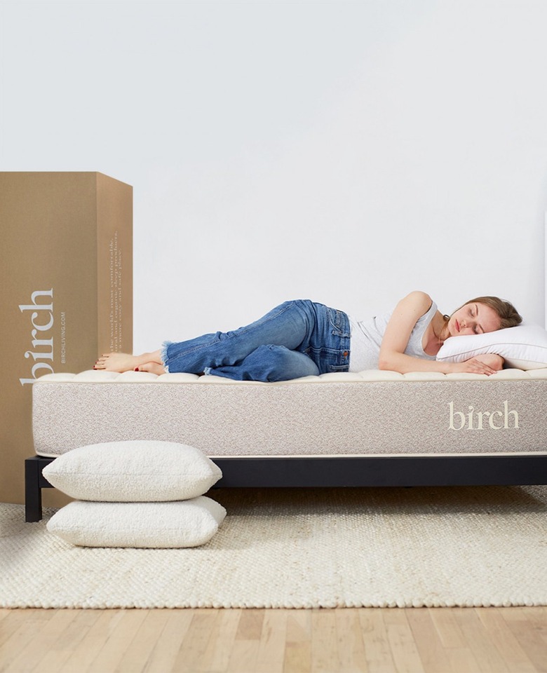 Girl sleeping on the birch natural mattress