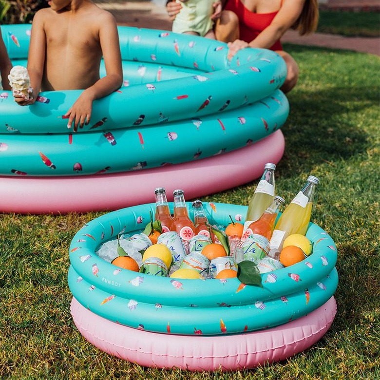 Blow-up pool with matching teal and pink blow-up cooler