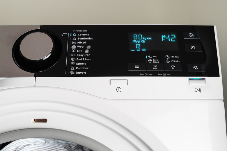 Clothes dryer control panel closeup.