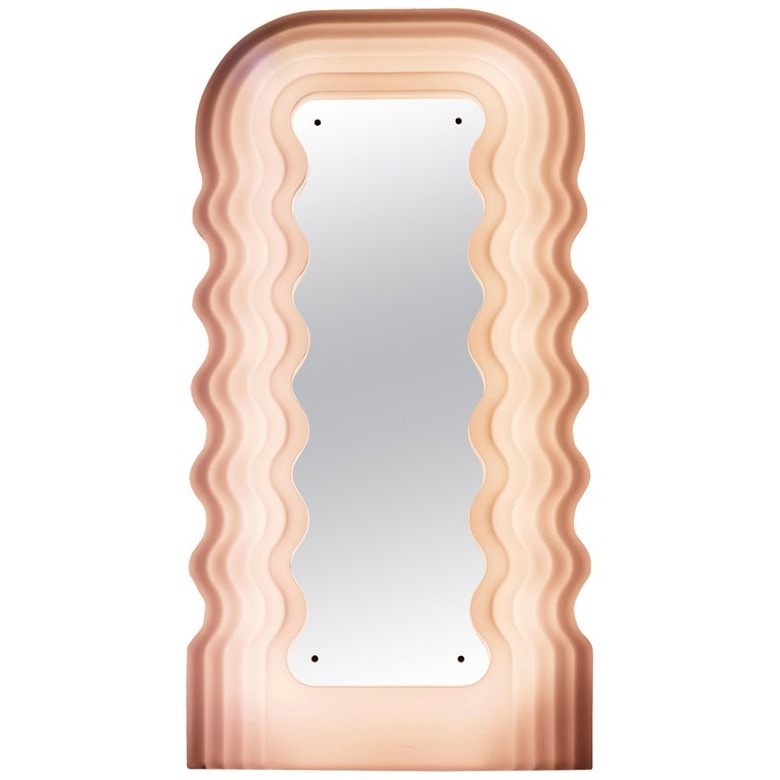 wavy mirror called Ultrafragola mirror designed by Ettore Sottsass