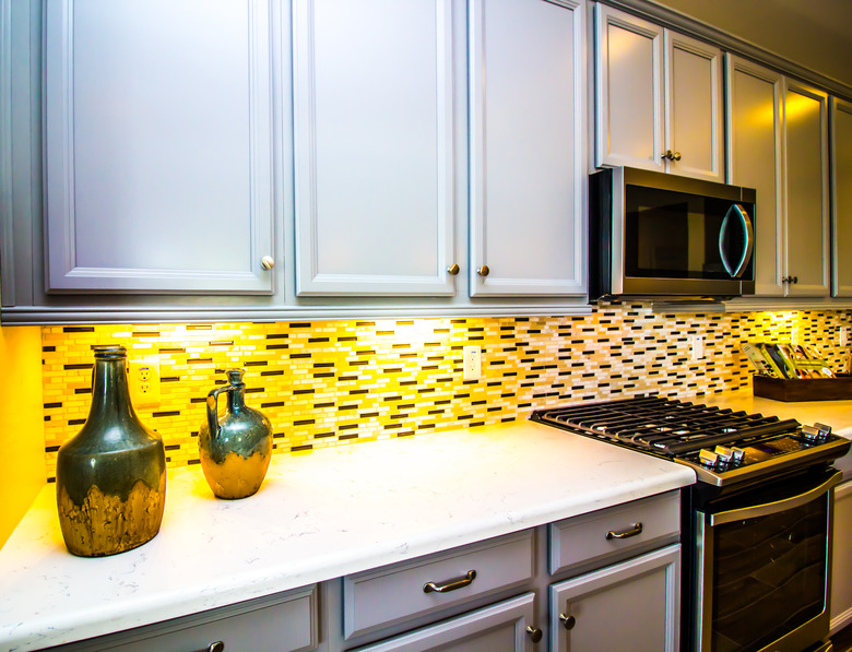 Kitchen With Decorative Jugs And Back Splash