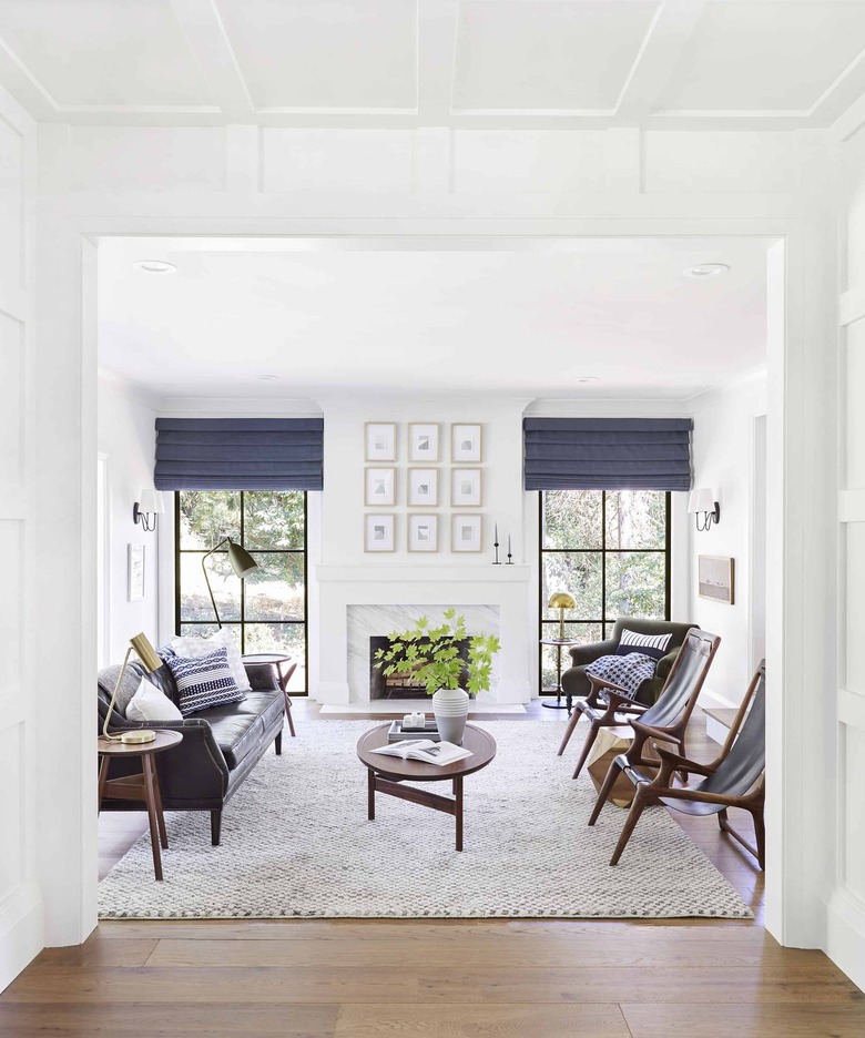 midcentury living room with wood lounge chairs