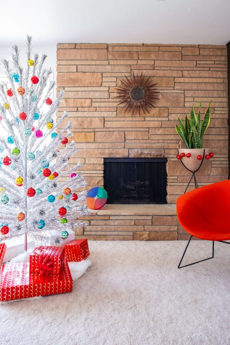 bold and colorful midcentury modern Christmas tree decor with white christmas tree