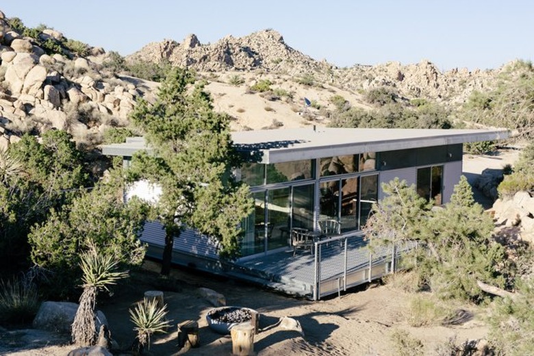 gray midcentury modern exteriors of prefab home