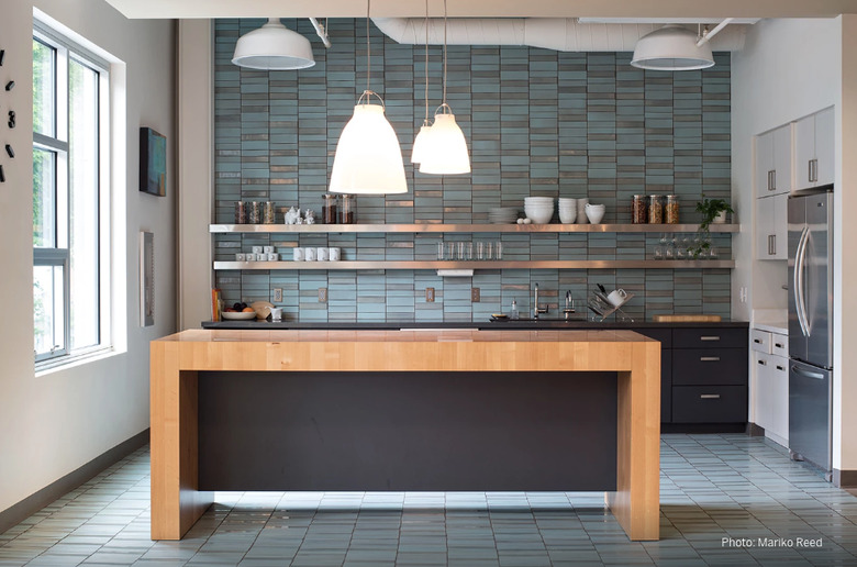 midcentury-inspired kitchen with blue ceramic tile floor