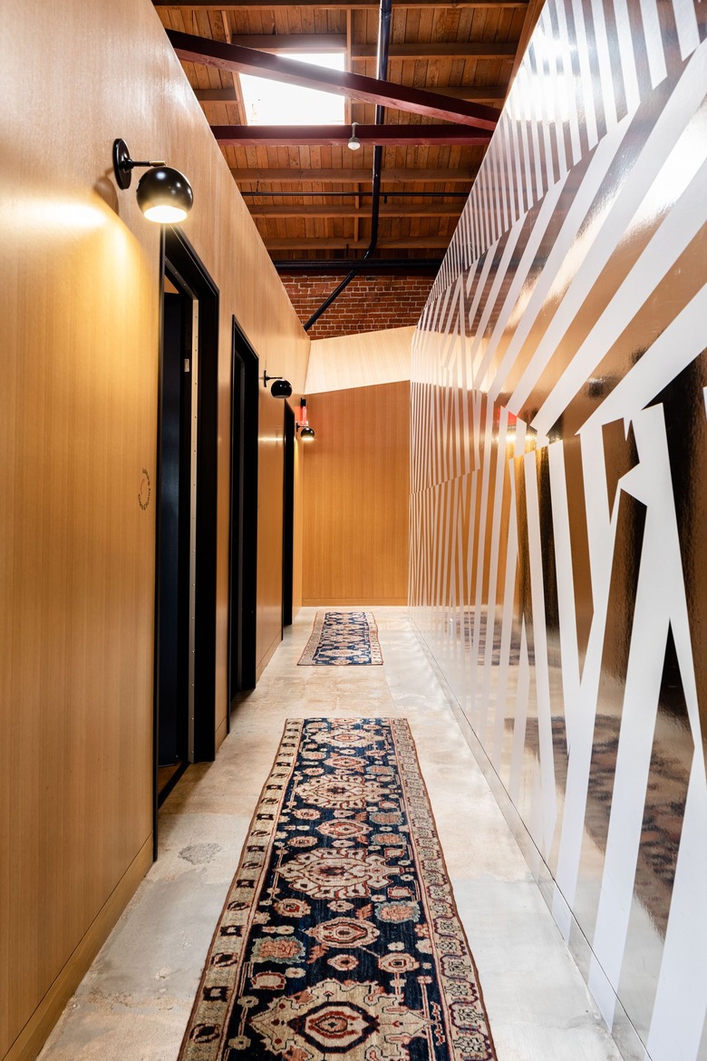 midcentury modern hallway lighting with wall sconces.