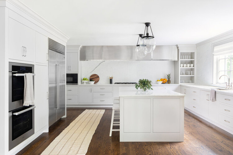 minimal style kitchen with white cabinets