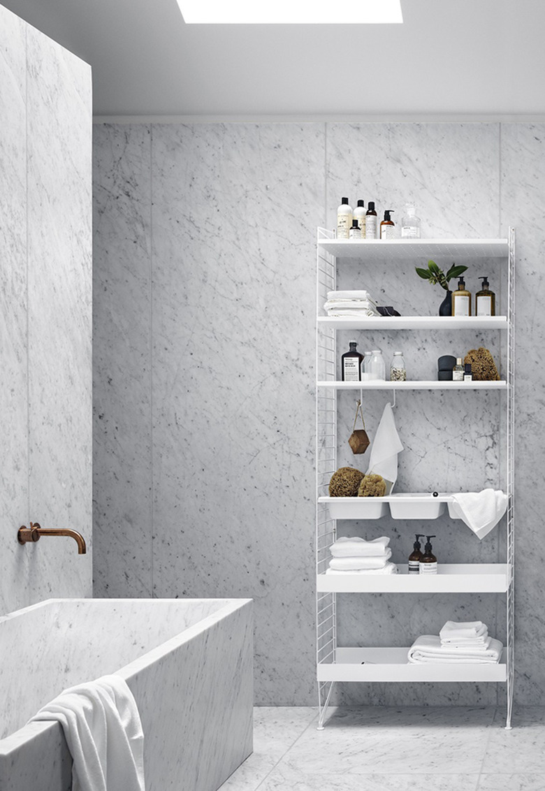 luxury marble bathroom with minimalist bathroom storage