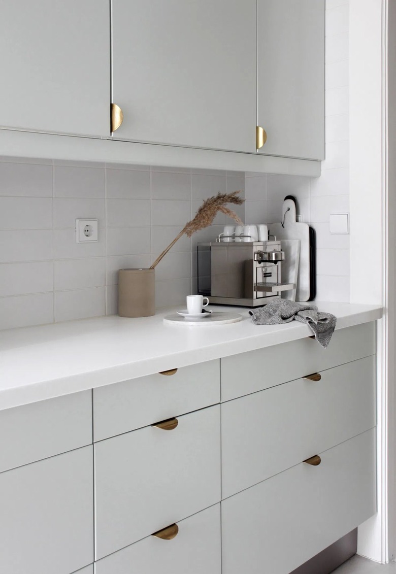 modern gray kitchen cabinets with espresso machine