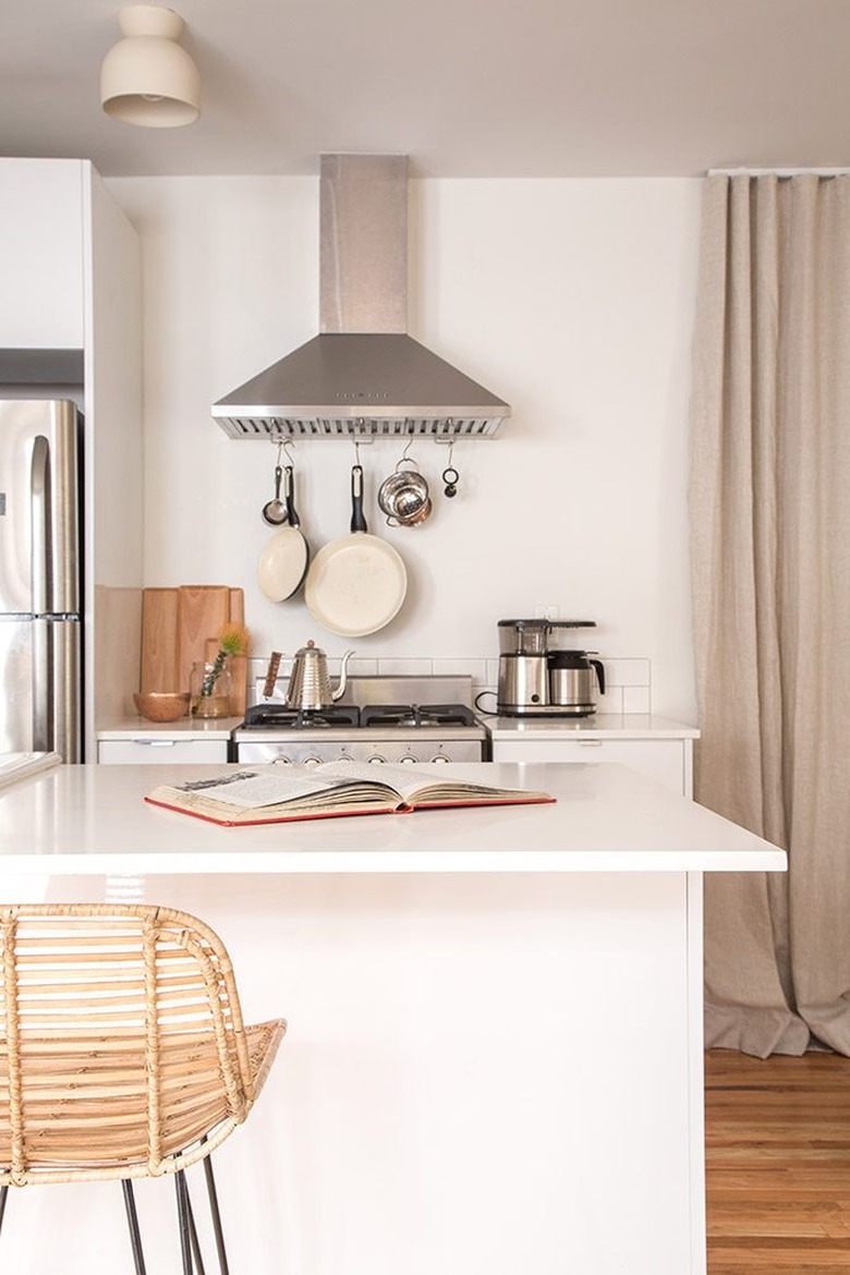 Kitchen essentials displayed in minimalist kitchen