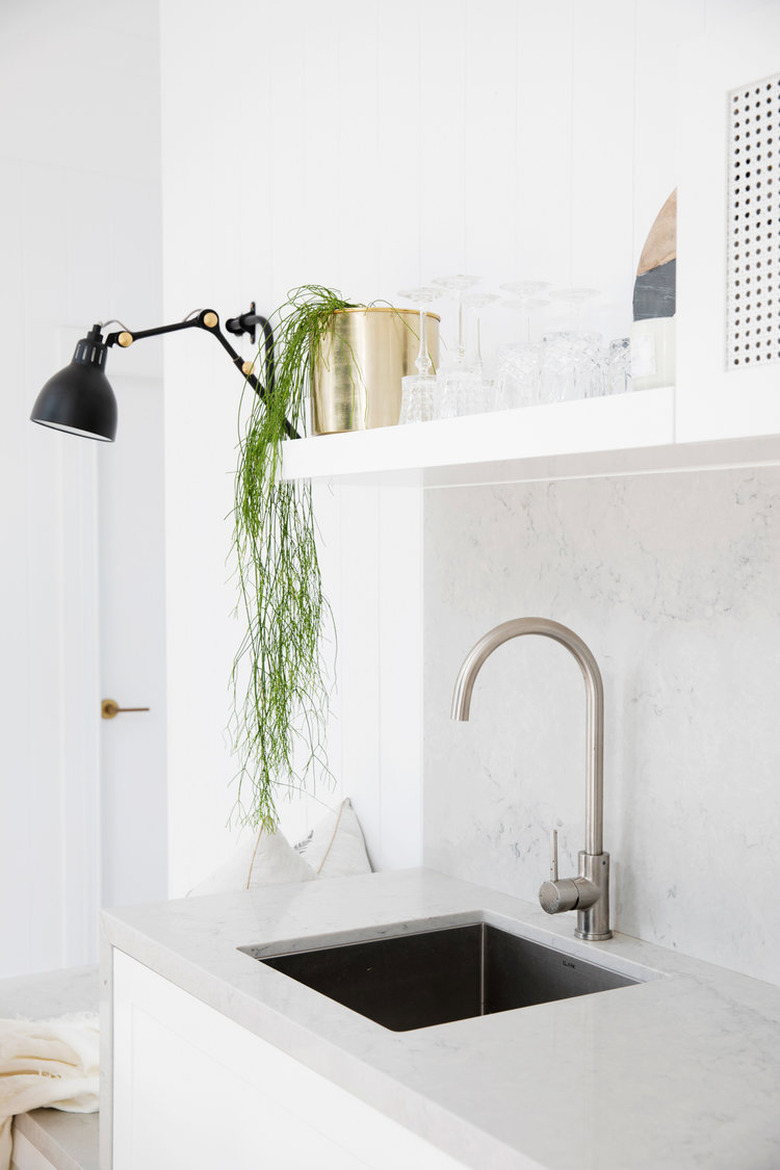 Integrated sink in minimalist kitchen