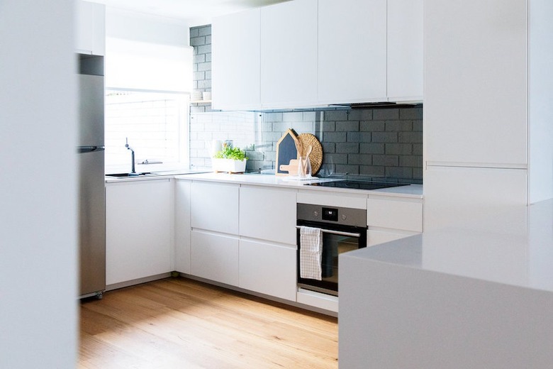 white flat panel cabinets in modern kitchen