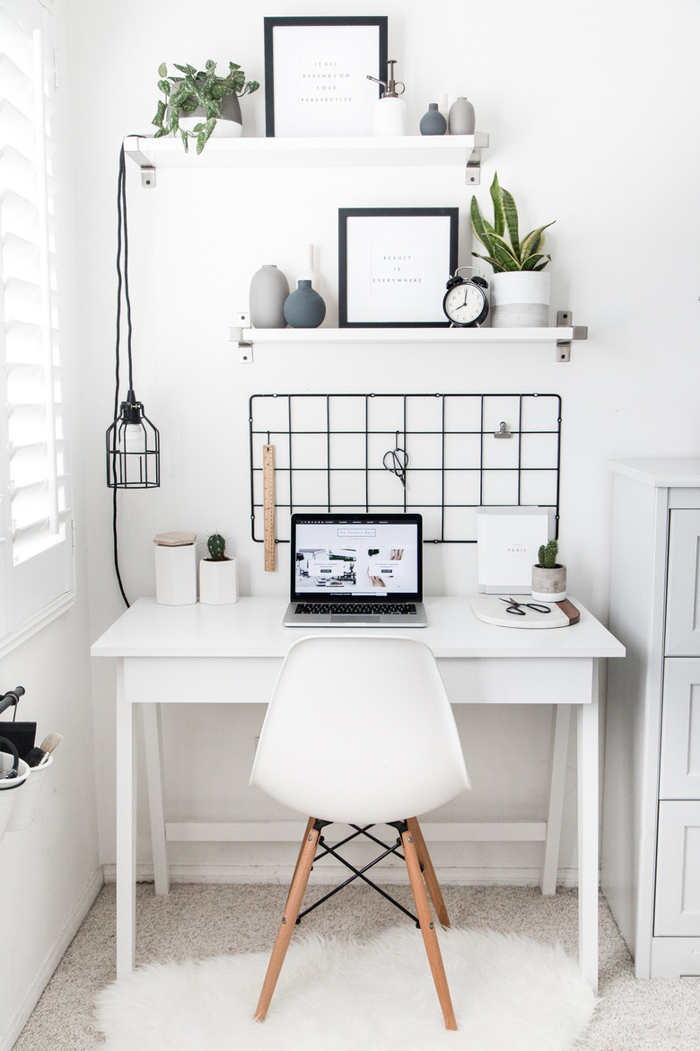 minimalist modern home office design with floating shelves